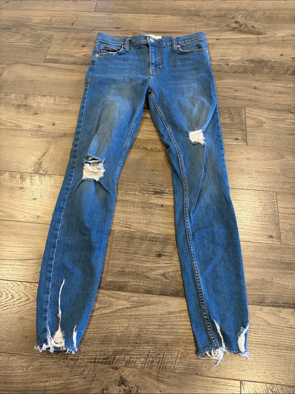 Free People Distressed Blue Skinny Jeans with raw hem